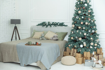 new year cozy home interior with christmas tree and garlands