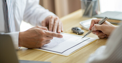Loss Adjuster Insurance Agent Inspecting Damaged Car. .Sales manager giving advice application form...