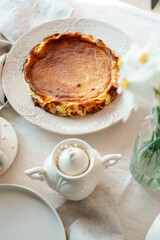 Beautiful served fresh baked basque cheesecake on a table