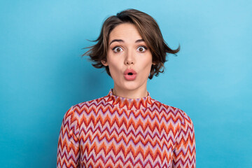 Photo portrait of attractive young woman impressed stare plump lips dressed stylish striped clothes isolated on blue color background - obrazy, fototapety, plakaty