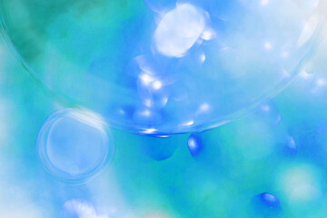 Oil bubbles close up. circles of water macro. abstract orange and fiery red background