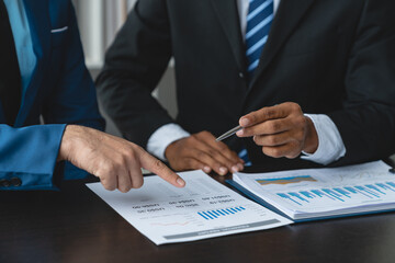 Modern business people meeting with startup projects pointing to discussion calculations and analysis Charts and graphs of finance, business and accounting data. teamwork concept.