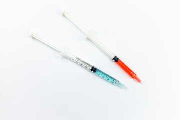 Medical syringes on a white background. Close-up.