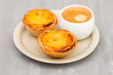 Egg tart, traditional Portuguese dessert, pastel de nata and coffee