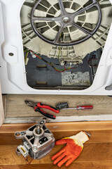 process of repairing the electric motor of a washing machine
