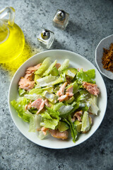 Leaf salad with hot smoked salmon