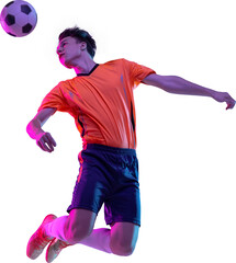 Young man, football player in unifrom, in motion, jumping with ball isolated over transparent background. Scoring winning goal. Concept of sport, competition, action and motion, lifestyle © master1305