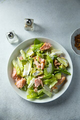 Leaf salad with hot smoked salmon
