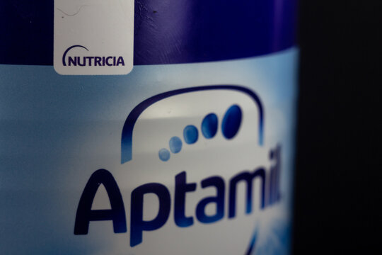 BELGRADE, SERBIA - MARCH 22, 2023: Selective blur on nutricia logo on a Box Of Aptamil 1 Baby formula. Nutricia, is a brand of baby formula, powdered milk and child nutrition part of Danone.