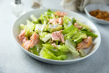 Leaf salad with hot smoked salmon