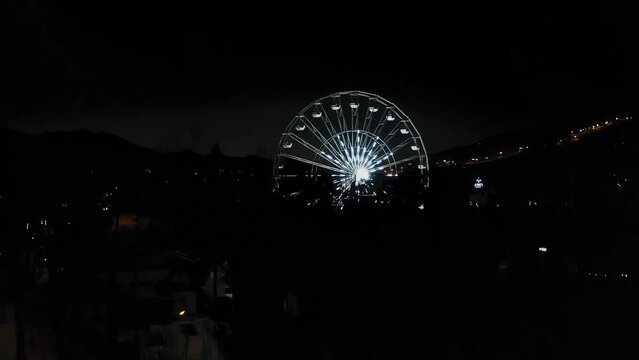 Drone Aerial Reveal Ferris Wheel in Winter - Polish City Zakopane