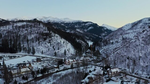 Taty Mountains Aerial Drone View with traditional houses and village in winter