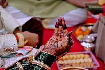 Hand of Indian Bride in Wedding Pooja. Hindu Wedding Ceremony for Bride. Maharashtra Culture.