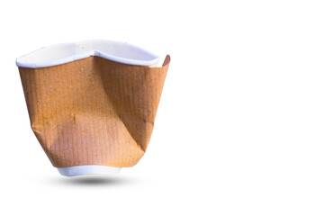 A crumpled used brown coffee paper cup isolated  on white background. Environment friendly concept.