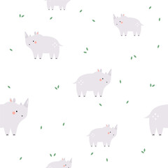 Seamless pattern on white background with adorable funny rhinos and green foliage