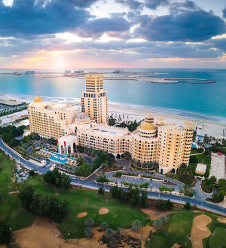 Ras Al Khaimah, United Arab Emirates - December 4, 2021: Waldorf Astoria hotel and resort in Ras al Khaimah near Al Hamra village aerial view