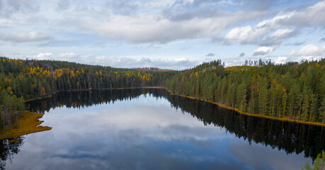 Autumn view of a lake and forest in Ludvika, Dalarna, Sweden.