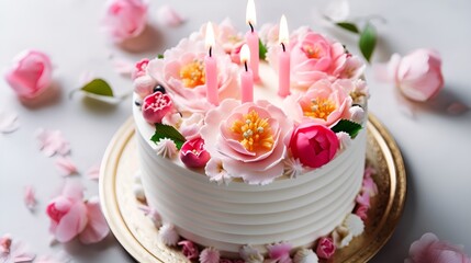 Fototapeta na wymiar Vanilla birthday cake decorated with colorful flowers