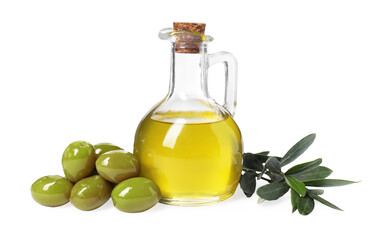 Glass jug of cooking oil, ripe olives and green leaves isolated on white
