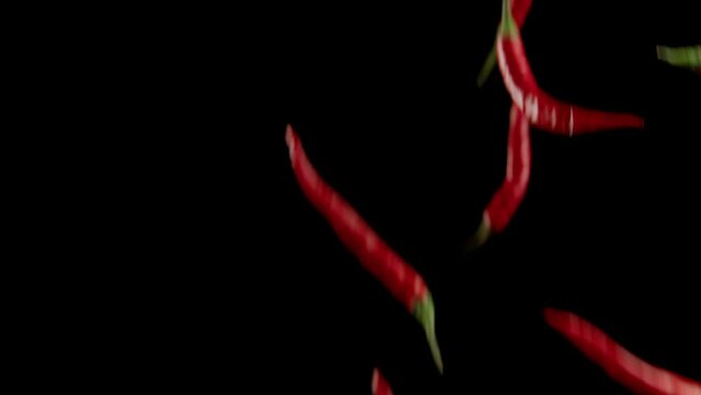 Hot chili peppers are scattered