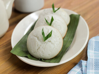 Kue Apem is traditional food from Indeonesia, made from rice flour that is left to sit overnight by mixing eggs, coconut milk, sugar and tape and a little salt