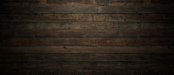 Horizontal old wooden planks and atmospheric light. Wood wall texture.