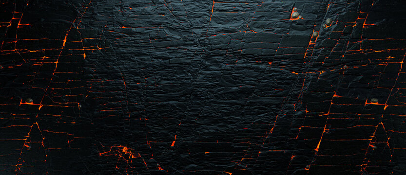 Abstract rock background with fire gaps between stones cut rock surface. Lava and rock backdrop with atmospheric light.