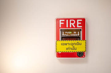 Fire alarm on the wall in subway in Bangkok,  At the Bangkok subway fire warning equipment for emergency.