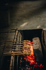 burning wood burning satay bali lilit sate