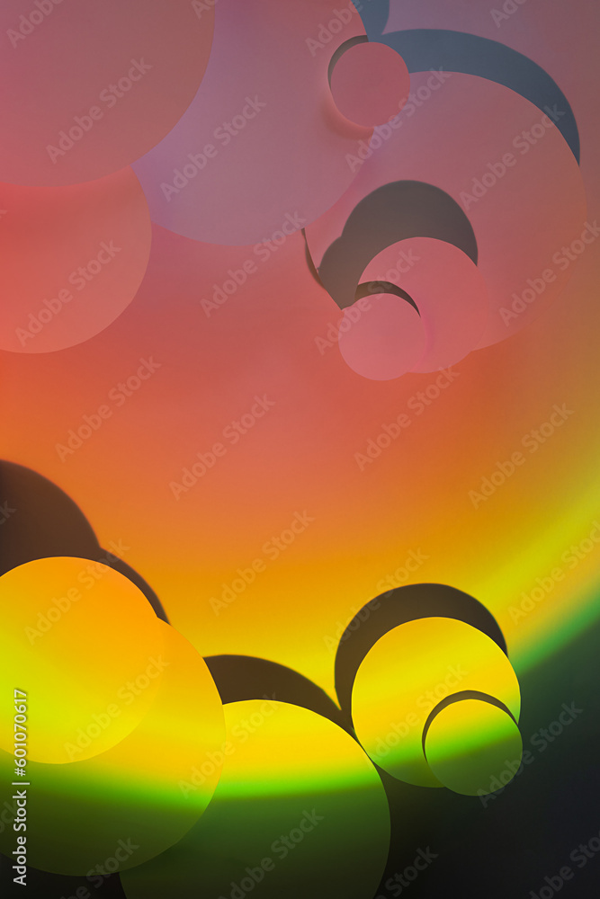 Poster vibrant abstract pattern of different circles fly with radial gradient of gentle pink and yellow col