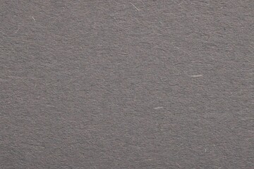 Texture of grey paper sheet as background, top view