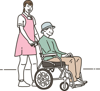 車椅子に乗る高齢者男性と女性の介護士
