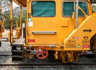 The ballast tamping machine to maintain the sleeper and ballast stone.