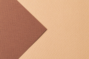 Fototapeta premium Rough kraft paper background, paper texture different shades of brown. Mockup with copy space for text