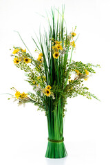 Bouquet of artificial yellow flowers isolated on a white.