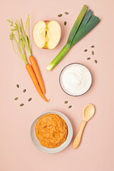 Baby puree made of fresh vegetables and fruits. First baby solid food recipe idea. Top view,  flat...