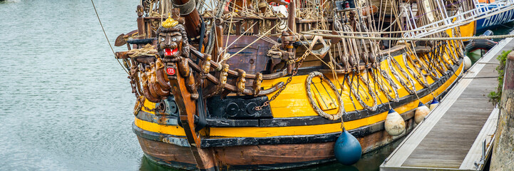 Bow of the Shtandart ship, a replica of an 18th century Russian frigate in the Port of La Rochelle, France 