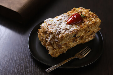 Napoleon puff pastry with cream and strawberries. Shallow depth of field
