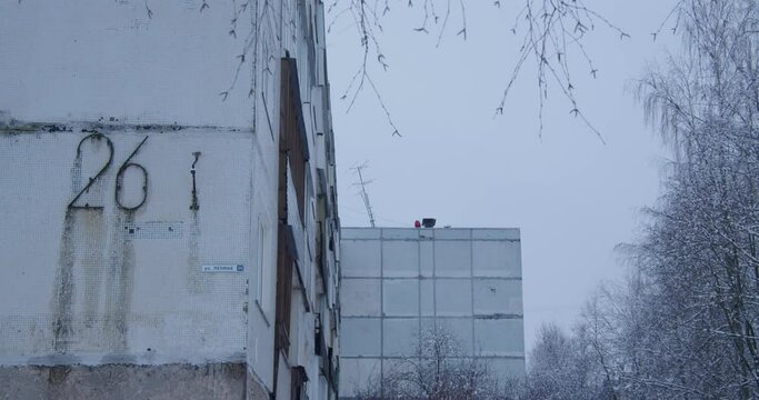 an old soviet house, khrushchev, a dull atmosphere post-soviet space, number twenty-six. 