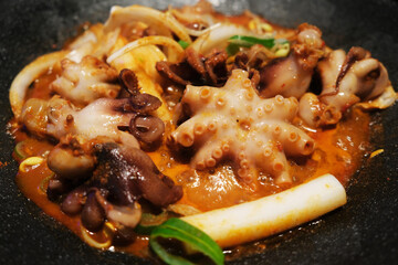 close up Korean spicy Stir-fried Octopus. Traditional Korean food