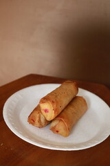 Lumpia or lunpia, traditional snacks from Indonesia. Traditional spring rolls contain stir-fried bamboo shoots, eggs, and chicken or shrimp