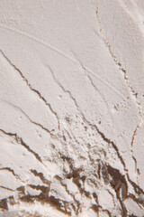 Pastel colored wallpaper, background, design, banner. Creative image of sand, powder with imprint and textures. Creative art photography. Abstract nature background. Minimalism