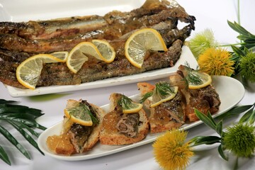 roasted fish river lamprey (lampetra fluviatilis) on a bread