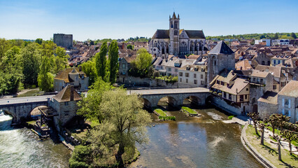 Aerial view of the medieval town of Moret-sur-Loing in Seine et Marne, France - Stone bridge...