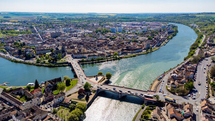 Aerial view of the confluence between the Seine and the Yonne showing different colors of water...