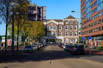 Rotterdam's Poortgebouw ("Gateway") is an old brick building  spanning Stieltjesstraat ("stilt street") at the entrance of Binnenhaven ("inner harbour") canal in the Netherlands