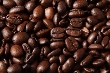 MACRO PHOTOGRAPHY OF ROASTED COFFEE BEANS. FOOD CONCEPT.