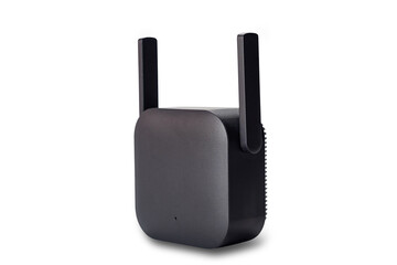 Closeup view of black wireless wi-fi signal range extender with adjustable antennas isolated on white background with clipping path.