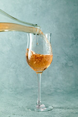 Pouring a glass of rose wine