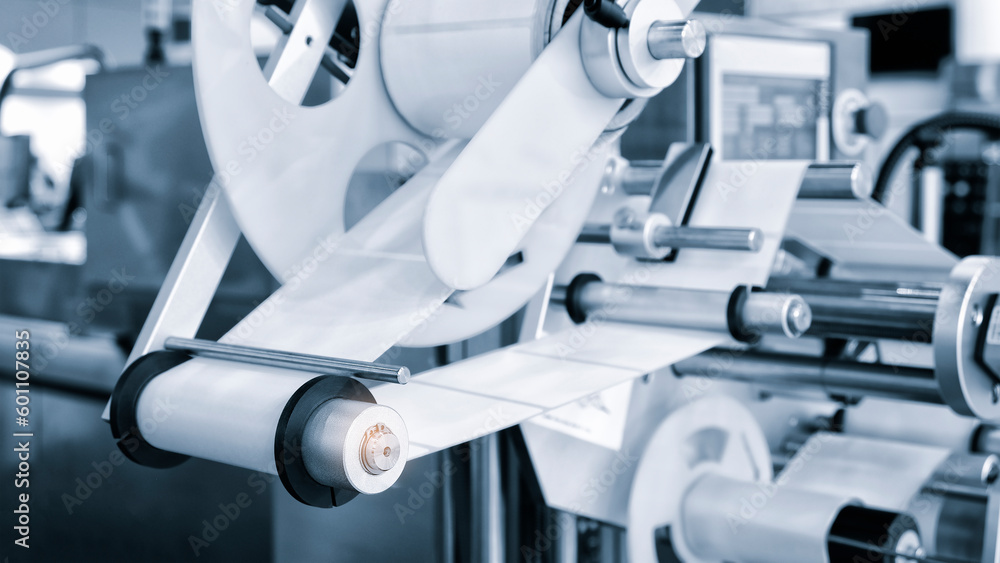 Poster fragment of the conveyor of sticking labeling machine. abstract industrial background.